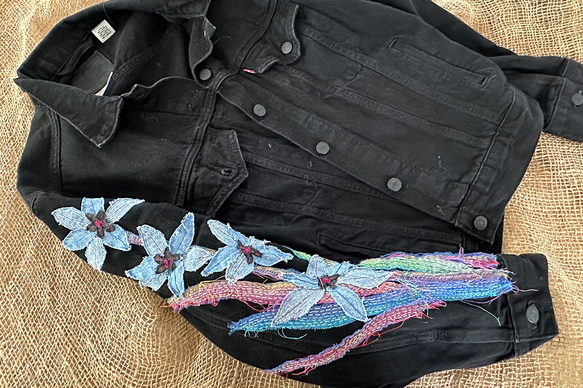 slow stitched sleeve on denim jacket